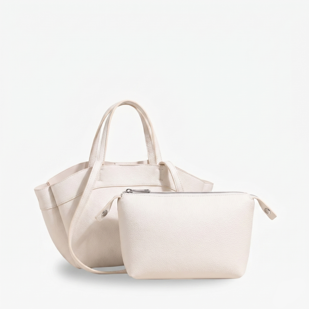 Beige handbag with a smaller pouch on a light gray background